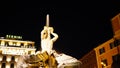 Night long exposition of the triton of the homonymous fountain and the Bernini hotel in Rome