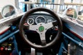 Sixties old fashioned motor sport formula 3 Bianchini car steering wheel and dashboard close up