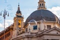 Soap bubbles flying on Piazza del Popolo, People Square in Rome surrounded by ancient churches like Santa Maria in Montesanto with Royalty Free Stock Photo