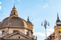 Soap bubbles flying on Piazza del Popolo, People Square in Rome surrounded by ancient churches like Santa Maria in Montesanto with Royalty Free Stock Photo