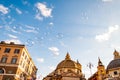 Soap bubbles flying on Piazza del Popolo, People Square in Rome surrounded by ancient churches like Santa Maria in Montesanto with Royalty Free Stock Photo