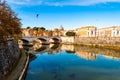 Tiber river streams, Ponte Vittorio Emanuele II bridge, flying seagulls and Rome cityscape view with St. Peter dome on the Royalty Free Stock Photo