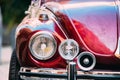 Rome, Italy. Close Up Headlight Of Old Retro Vintage Red Color Volkswagen Beetle Car Parked At Street Royalty Free Stock Photo