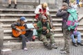 Rome, Italy, October 10, 2011: Homeless play the guitar on the steps of a Catholic temple