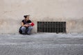 Rome, Italy, October 13, 2011: A homeless woman with a baby asks for alms