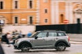 Gray Color Mini Cooper Countryman S All4 Car Driving On City Street Royalty Free Stock Photo