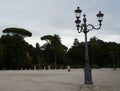 People walks in Rome in rainy gloomy day