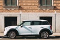 Rome, Italy. White Color Car Mini Cooper Mini Countryman Parked On Street Royalty Free Stock Photo