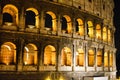 Rome, Italy. One of the most popular place in world at evening - illuminated Roman Coliseum under dark sky