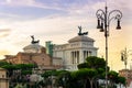 ROME , ITALY ;Roman walks. Spectacular sunset in Rome with the Monument of Victor Emmanuel II in background