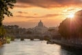Rome Italy. San Pietro basilica in the Vatican, ponte Sant Angelo and Tiber river, sky at sunset Royalty Free Stock Photo