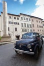 ROME, ITALY- September 10, 2016: The blue old retro car Fiat parked on the street of Rome