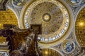 View of St. Peter`s Baldachin designed by Gian Lorenzo Bernini in 1634 against the dome of the St. Peter Basilica in Rome