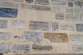 ROME, ITALY - SEPTEMBER 26, 2017: Marble plaques with iscriptions on wall of Basilica in Rome