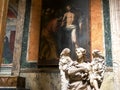 ROME, ITALY- SEPTEMBER 29, 2015: a statue of angel and a painting in the pantheon Royalty Free Stock Photo