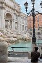 Rome, Italy, Tourists in front of the Trevi Fountain in the early morning Royalty Free Stock Photo