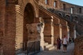 Rome, Italy, Tourists walking through the galleries of the Coliseum and looking at its ruins. Royalty Free Stock Photo