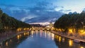 Rome, Italy: St. Peter's Basilica, Saint Angelo Bridge and Tiber River after the sunset day to night timelapse Royalty Free Stock Photo