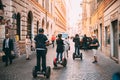 Rome, Italy. Tourist Rides Electric Scooter Segway At Street Royalty Free Stock Photo