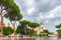 Rome, Italy. Tourists on Via Dei Fori Imperia street. Alter Of The Fatherland building in background