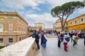 Rome, Italy. Vatican City. Groups of visitors to the Vatican Museums in the Cortile della Pinacoteca. Royalty Free Stock Photo