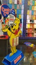 Golden teddy bear display wall of Haribo candies of various flavors for sale by weight in multiplex cinema. Bonn-based German Royalty Free Stock Photo