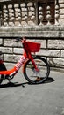 JUMP logo on UBER red bicycles. Bike sharing service integrated in the app