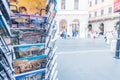 ROME - JUNE 14, 2014: Tourist postcards in a shop. The city attracts more than 10 million people annually