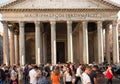 A croud of European and Asian tourists infront of Pantheon.