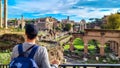 Rome - Man with panoramic view on the Roman Forum and Rome Skyline from the Palatine Hill in the ancient city of Rome, Lazio Royalty Free Stock Photo