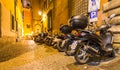 ROME - MAY 20, 2014: Motorbikes parked along city streets. Motor Royalty Free Stock Photo