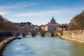 Rome Skyline with Vatican St Peter Basilica of Vatican and St Angelo Bridge crossing Tiber River in the city center of Rome Italy. Royalty Free Stock Photo