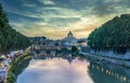 Rome, St. Peter`s Basilica in Vatican City and Sant`Angelo Bridge in sunset light,Italy., Europe Royalty Free Stock Photo