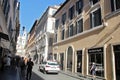 Rome Street with Designer Stores. Van Cleef, Louis Vuitton