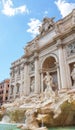 Rome trevi fountain and art statue Fontana di Trevi in Rome, Italy with bright day blue sky. Trevi is most famous fountain of Royalty Free Stock Photo