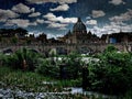 Rome under heavy rain view of St. Peter dome, Tiber river and St. Angel bridge