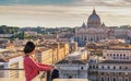 Rome Vatican Italy sunset city skyline with woman tourist Royalty Free Stock Photo