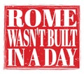 ROME WASN`T BUILT IN A DAY, text on red stamp sign Royalty Free Stock Photo