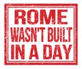 ROME WASN`T BUILT IN A DAY, text on red grungy stamp sign Royalty Free Stock Photo