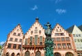 Romerberg square with the city hall and justice statue on blue sky, main landmark of Frankfurt, Germany