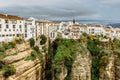 Ronda, Andalucia. Landscape of white houses on the edge of steep cliffs surrounded by mountains. Village panorama.View of the Tajo