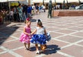 RONDA, ANDALUSIA/SPAIN - SEPTEMBER 10: Three little girls in traditional spanish dress dancing in the square. The local holiday of Royalty Free Stock Photo