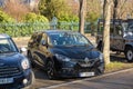 ront view of new black Renault van car parked in city center