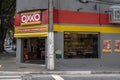 ront view of Oxxo supermarket in Sao Paulo city. Oxxo is popular Mexican chain of grocery stores