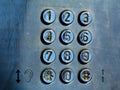 dial pad and buttons of old coin operated street phone Royalty Free Stock Photo