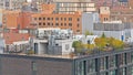 Roof of an apartment building with ventilation system and trees