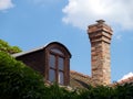 Roof with attic and chimney Royalty Free Stock Photo