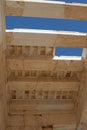 Roof beams against the blue sky. Propylaea Acropolis. Athens