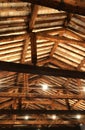 Roof with beams facing bricks and halogen lamps Royalty Free Stock Photo