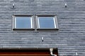 Roof of black slate tiles and skylights Windows